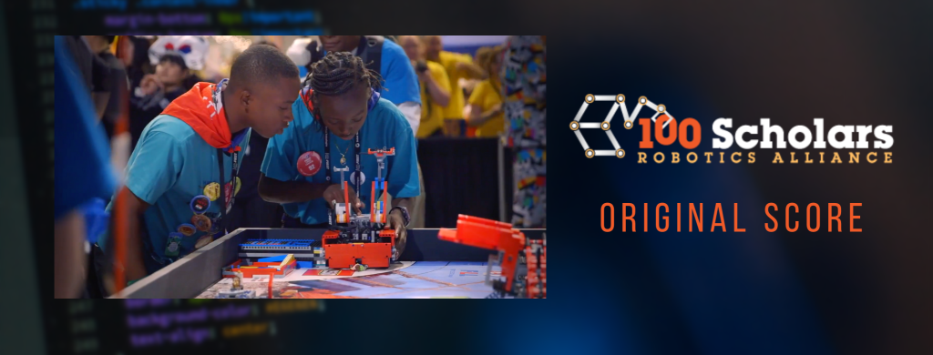 this year's winner of the Mutual of America community partnership award. Flavorlab Score provided original music for the documentary on the organization.|Still of two engineers working on a robot through the 100 Scholars Robotics Alliance