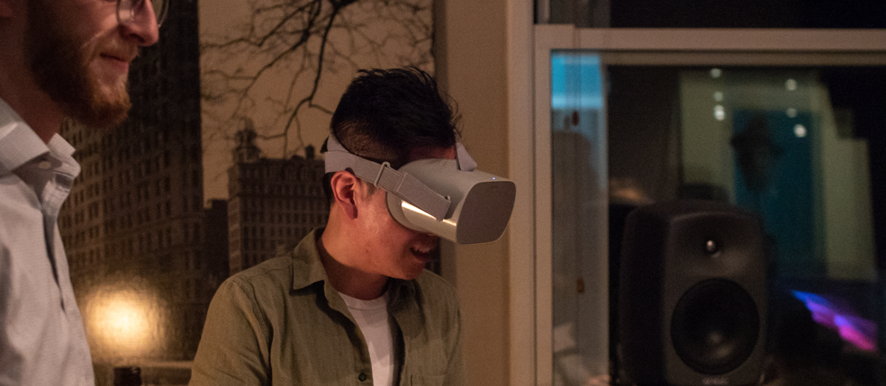JC Chao wearing a VR headset at the Flavorlab 360 showcase with Gramercy Tech|Flavorlab Sound logo||