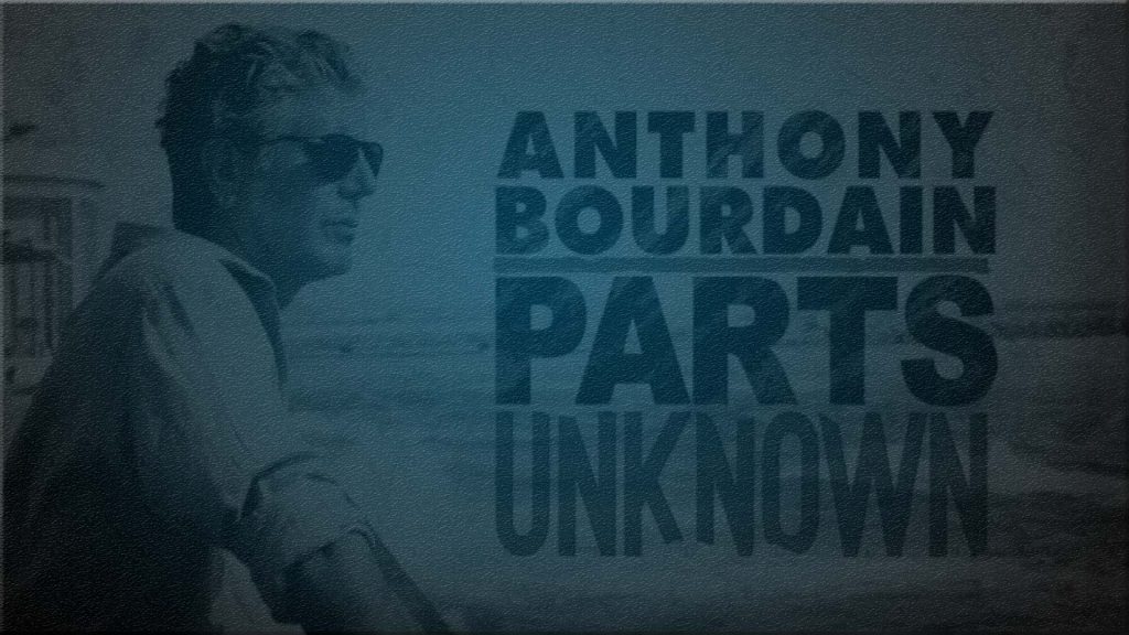 Still of Anthony Bourdain looking out over the water with the words Anthony Bourdain: Parts Unknown laid over from the opening of Anthony Bourdain: Parts Unknown. Flavorlab Score composed original music for the series.|Still of profile of Anthony Bourdain in a flannel shirt sitting on a rock wall by the road and staring off into the distance with the words "Anthony Bourdain: Parts Unknown" overlaid to his right. Flavorlab Score and Producer's Toolbox provided original music and music licensing for the series.