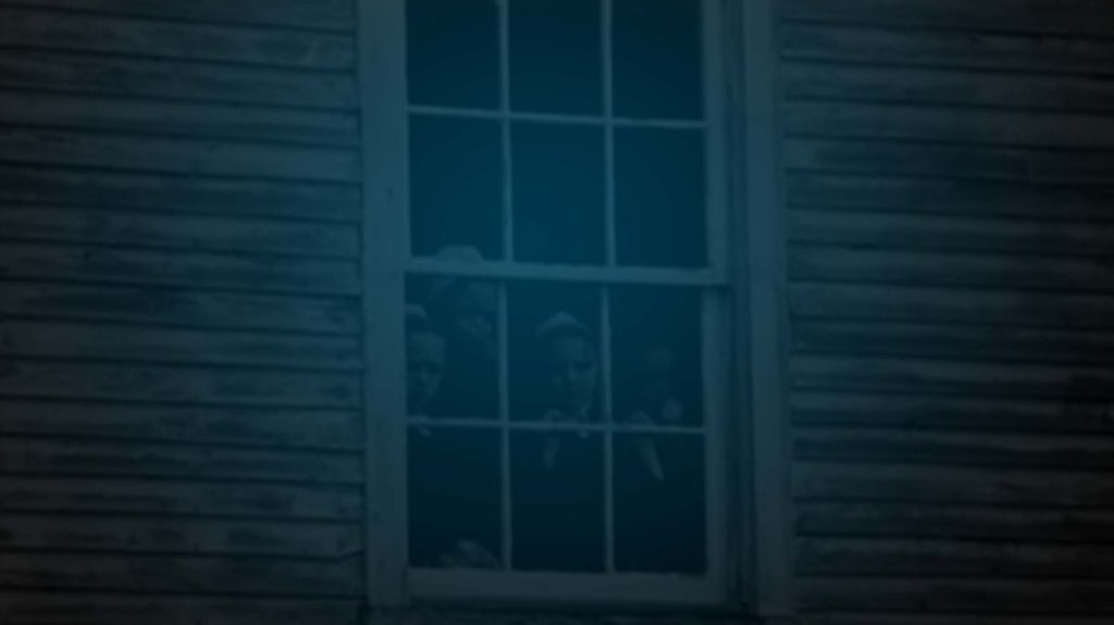 Still of children looking out a school window in Forgiveness: A Time To Love and a Time To Hate. Flavorlab Sound's Brian Quill provided sound design and mix for the two part film.|