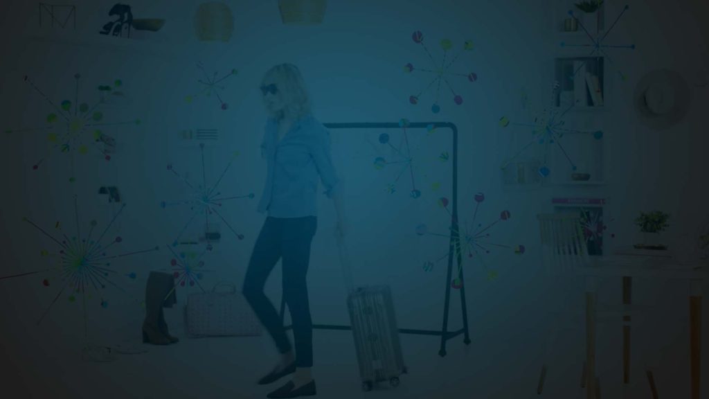Still from Neiman Marcus advertisement. Producer's Toolbox provided music licensing for the What To Pack Holiday Edition spot.||