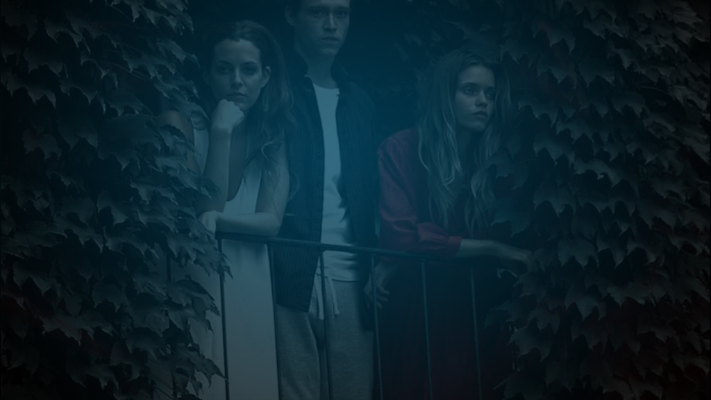 Still of the cast on a balcony in film Welcome The Stranger. Flavorlab Sound provided sound design and mix for the feature.||||