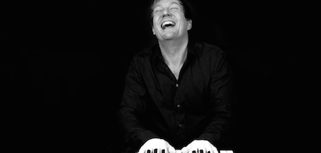 Photo of Producer's Toolbox composer Ben Stivers playing piano||